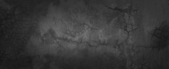 Texture of dark gray concrete wall, Texture of a grungy black concrete wall as background.