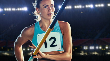 Pole Vault Jumping: Portrait of Professional Female Athlete on World Championship Running with Pole...