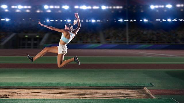 Long Jump Championship: Professional Female Athlete Jumping on Long Distance. Determination, Motivation, Inspiration of a Successful Sports Woman Setting New Record Result. Competition on Big Stadium.