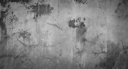 Horizontal dark old cement wall for the background, Texture of a grungy black concrete wall as background.
