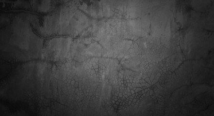 Texture of dark gray concrete wall, Texture of a grungy black concrete wall as background.