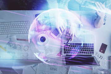 Double exposure of man and woman working together and technology theme drawing. Computer background. Top View. High tech concept.