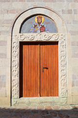 Entrance door of Church in Podmaine Monastery in Budva, Montenegro 