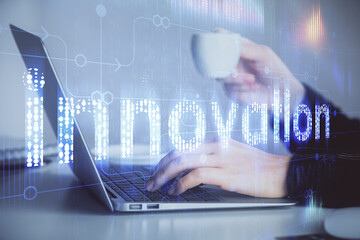 Multi exposure of woman hands working on computer and data theme hologram drawing. Tech concept.