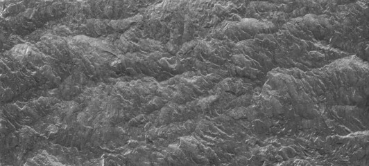 Abstract texture of the stone wall. Close-up. Light gray rock backdrop.