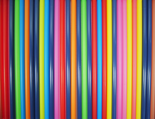 Colored plastic sticks arranged in a pattern.