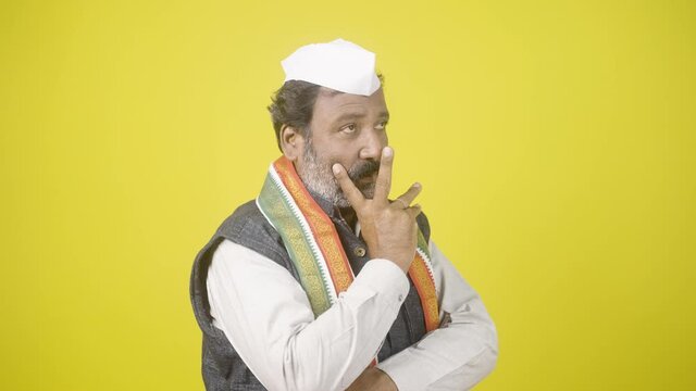 Senior politician thinking or worried about upcoming future elections, poll results and black money.