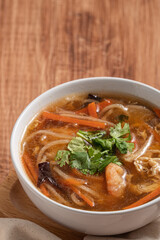 Delicious traditional thick soup with shrimp meat ball and vegetables.