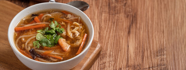Delicious traditional thick soup with shrimp meat ball and vegetables.