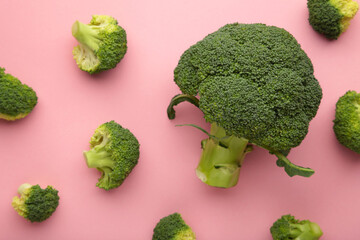 Broccoli cabbage on a pink background. Pattern of fresh broccoli cabbage.