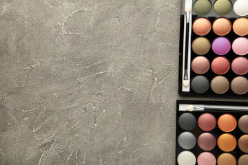 Beauty professional makeup palette on grey background. Make up cosmetics