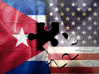 American flag, Cuban flag. Creative puzzle hologram. Missing piece of puzzle concept