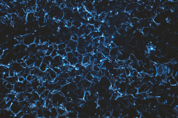 Abstract porous background. Mesh uneven surface. Macro photography.