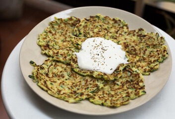 fried zucchini pancakes with greek yogurt