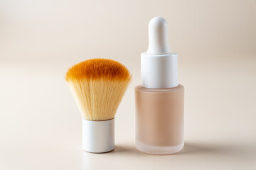 Liquid foundation cream unbranded bottle with makeup brush. Facial correction, liquid concealer,...