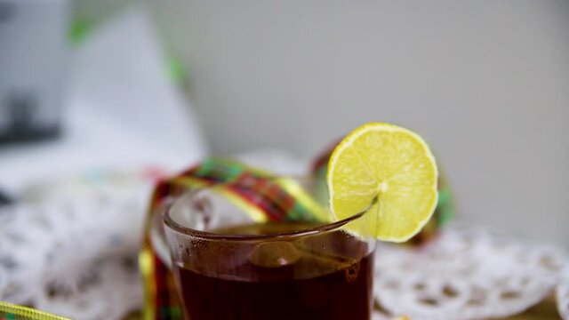 tea with lemon cinnamon stick 