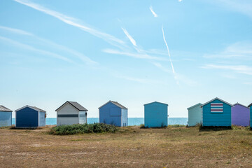Fototapeta na wymiar colourful beach huts at the seaside Hayling Island Hampshire England