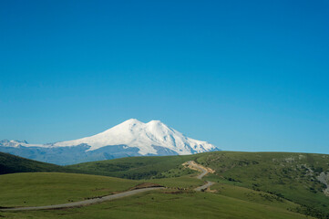 Plakat Russia North Caucasus. Mountain peaks. View of Elbrus.