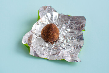 bitter chocolate candies truffle in cocoa, cocoa candies with a minimum amount of sugar, closeup of...