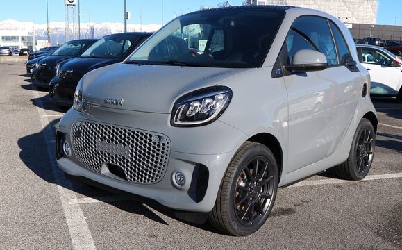 Udine, Italy. November 30, 2021. Gray Smart EQ Fortwo in display outside the local dealership of the german automaker. They are a battery electric vehicle variant of the Smart city car.