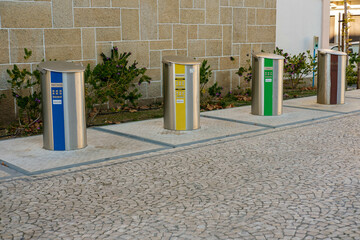 4 recycling trash cans on the streets of Castelo Branco Portugal