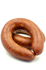 Turkish sausage on a white background. Sausage made from beef. Kangal sausage. Vertical view. close up