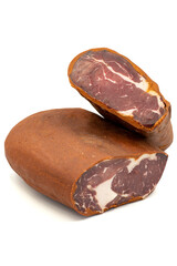 Turkish pastrami on a white background. Bacon made from veal. Turkish bacon, pastrami (Kayseri pastirma). Vertical view. close up