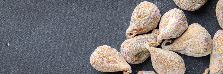 dried figs natural sweets dried fruits meal snack on the table copy space food background rustic. top view keto or paleo diet veggie vegan or vegetarian food