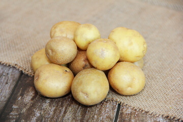 round fruits of fresh yellow potatoes