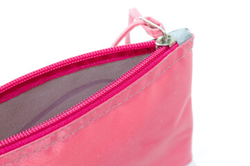 Naklejka premium Pink bag with zipper and white background