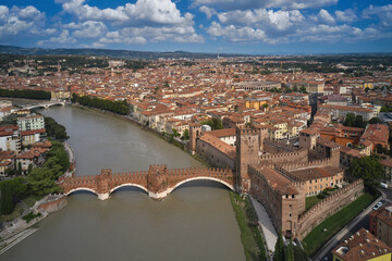Verona, Italy aerial view of the historic city. Unesco Monument Scaliger Bridge in Italy top view....