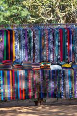 Handmade colorful Burmese fabric for sell in a tourist stall on the street market near Inle Lake in Burma, Myanmar