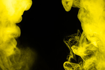 Yellow steam on a black background.