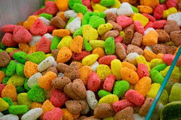 Multi-colored sweets in a large number of different shapes and tastes