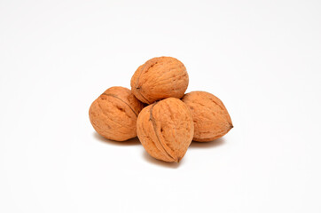 whole walnuts isolated on white background