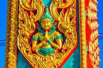 Praying buddha Wat Phadung Tham Phothi temple Khao Lak Thailand.