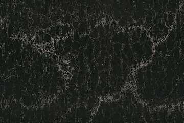 Black marble texture background pattern top view. Stone granite wall with bright stripes. Luxury abstract patterns. Marbling design for banner, wallpaper, packaging design template