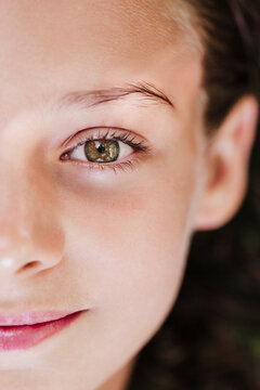 Smiling girl with hazel eyes