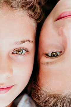 Cute girls lying side by side