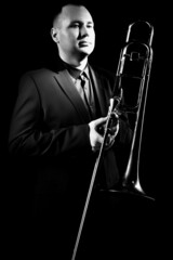 Trombone player. Portrait of jazzman classical musician trombonist
