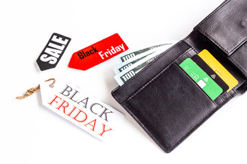 Discount shopping day - sale tag and wallet with banknotes and bank cards