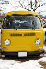 Classic vintage yellow transporter camper van parked in Portsmouth NH