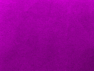 Violet velvet fabric texture used as background. Empty purple fabric background of soft and smooth textile material. There is space for text..