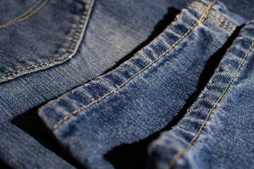 Naklejka premium Abstract image of the texture of blue denim