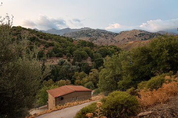 a solitary house in the mountains of Crete with a view over the hills, Theriso, Crete, Greece,...