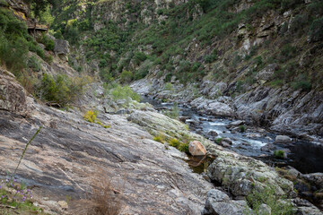 rocky river bank of Paiva river at Arouca Geopark, Municipality of Arouca, Aveiro District, Portugal - OCT2020