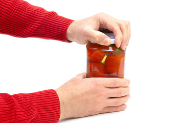 Opening a jar of pickled tomatoes