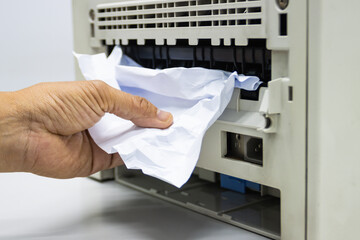 Technicians Removing Paper Stuck, Paper Jam In Printer At Office