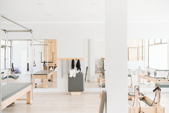 Exercise equipment and machines in empty pilates studio