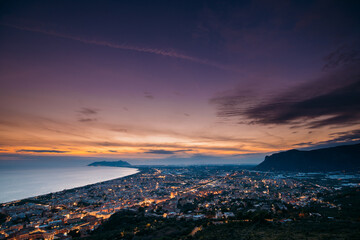 Terracina, Italy. Top View Skyline Cityscape City In Evening Sunset. City Illuminations